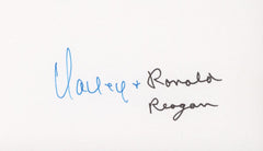 Nancy & Ronald Reagan signature cut. GFA Authenticated